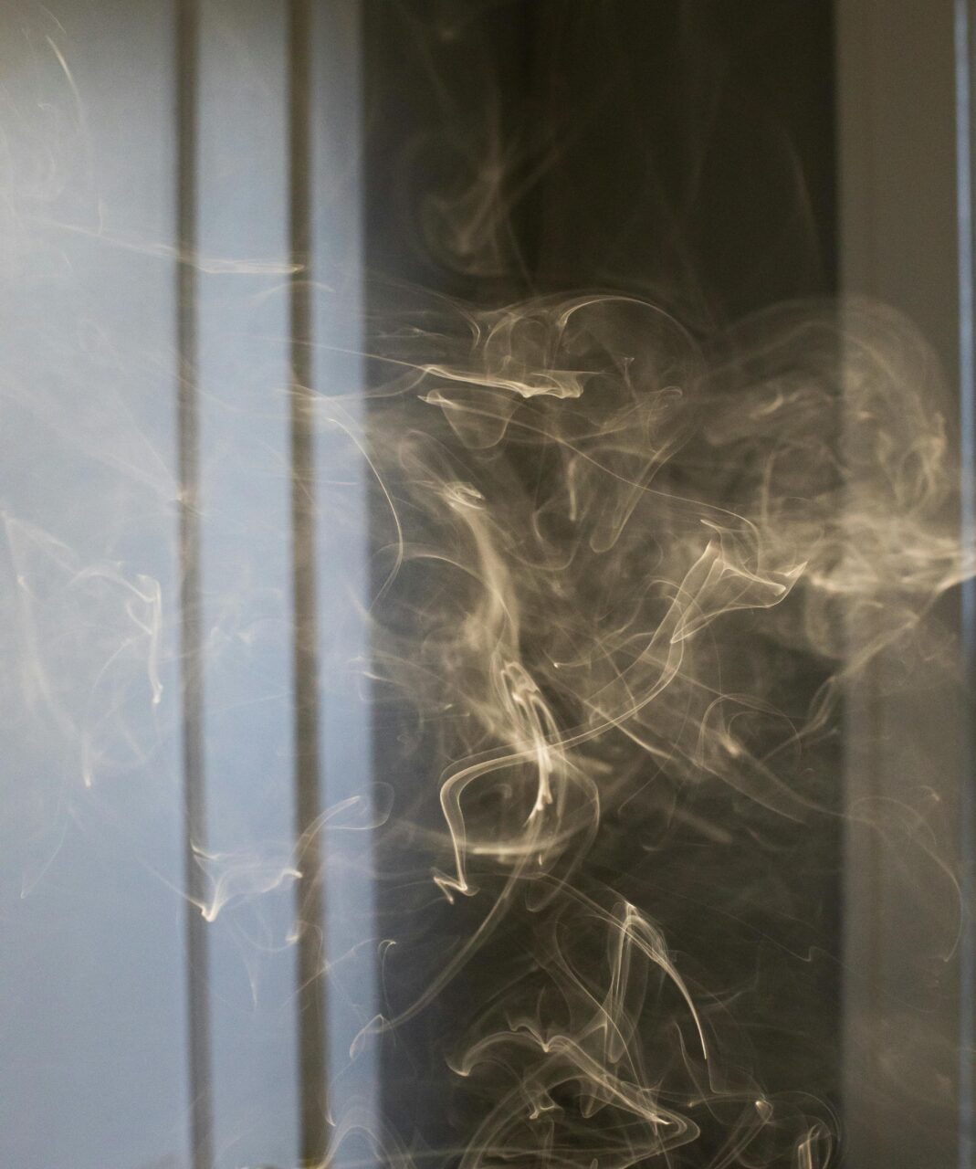 Cigarette smoke lingering in the air